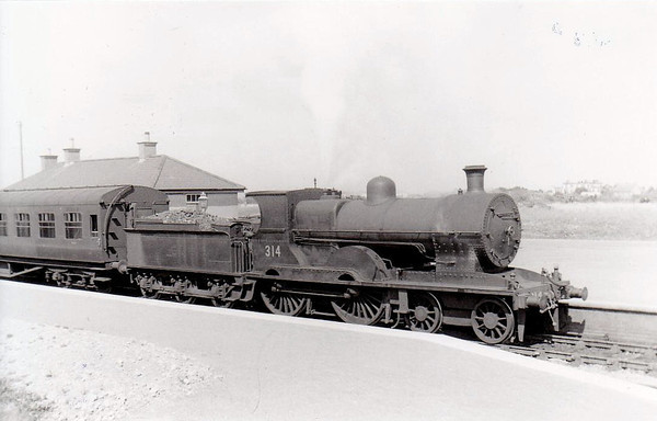 Class D10 - 314 - G&SWR Class 309 4-4-0 - built 1903 by Neilson Reid & Co. - 1925 to GSR, 1930 rebuilt with Belpaire boiler, 1945 to CIE - withdrawn 1957 - seen here at Rosslare Strand in 1955.