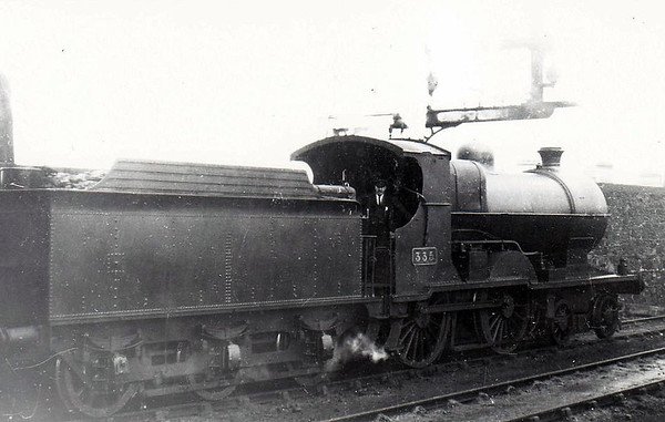 Class D 2 - 335 - Coey GS&WR Class 333 4-4-0 - built 1907 by Inchicore Works - 1925 to GSR, 1933 rebuilt with superheated Belpaire boiler, 1945 to CIE - withdrawn 1955 - seen here at Bray in 1938.