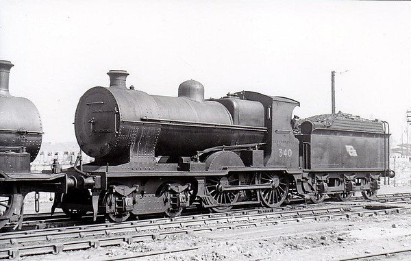 Class D 2 - 340 - GS&WR Class 333 4-4-0 - built 1908 by Inchicore Works - 1925 to GSR, 1932 rebuilt with Belpaire boiler, 1945 to CIE - withdrawn 1955 - seen here at Inchicore in 1948.
