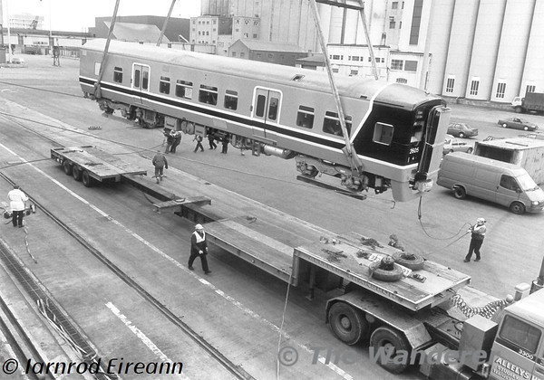 As part of the Kildare Commuter Route, 17 new DMUs, the 2600 Class, were purchased for the service. Delivery of these vehicles was on Monday 14th February 1994, three months before services commenced. The 2600 Class were the first railway vehicles built in the Far East for use in Europe. 

2605 is off loaded from MV Envoyager at Dublin Port. Mon 14.02.94

Photo courtesy of Iarnrod Eireann.