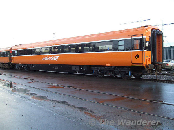 Waterford Graffiti victim 7151 stands in  Guinness Sidings Heuston. Note the black window surrounds. The vehicle has only been repainted on one side. Sat 20.01.07
