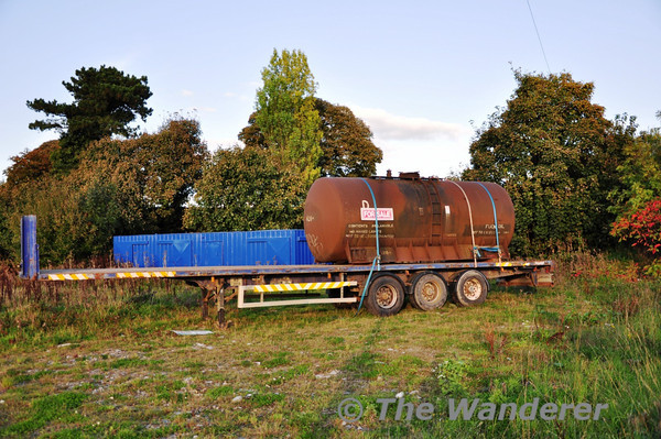 Anybody fancy buying a Fuel Oil wagon? While driving through Athy the other week this strange sight greeted me. Former Irish Rail Fuel Oil wagon 620A minus wheels is mounted on a 40ft trailer and its for sale. Sat 16.10.10
