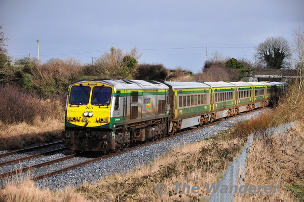223 passes Rosskelton with the 1200 Heuston - Cork during a brief sunny interlude on Wednesday 14th February 2013.