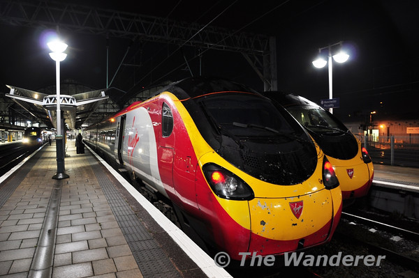 Early morning in Manchester Piccadilly sees 390123 waiting to depart with the 0643 to London Euston via Crewe. Thurs 03.10.13