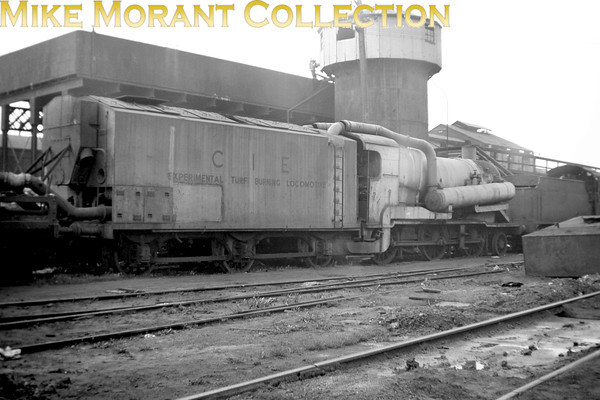 Vintage Irish Republic Railways - Steam in Eire - 1954Inchicore works on 24/4/54 with Bulleid's turf burning locomotive taking centre stage. This rebuilt loco had been cobbled together in 1952 using ex-GS&WR K3 2-6-0 as the base and never again saw main line service as it was simply a static test bed. Withdrawal and scrapping finally put her out of her misery in 1957.