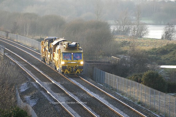7.1.18. Irish Rail Ballast Cleaner  781 passes Craigavon Lakes  heading from Kildare to Lisburn.