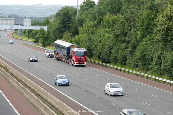 20.7.16. Belmond MK3 Carriage SLIGO gets transfered by road from Mivan Antrim to North Wall Dublin , photos taken at Fortwilliam  on the M2 Belfast.