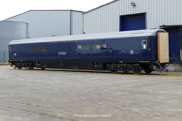 22.7.16. Belmond MK3 carriage 7137 KERRY gets loaded for the road transfer to Dublin North Wall at Mivan Antrim .