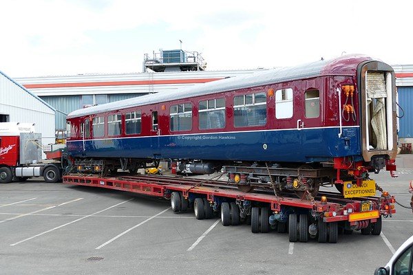 13.5.18. Former NIR 80 Class Driving Trailer 8749  now Preserved by the Downpatrick & County Down Railway , this collection shows photos of the road move from Northern Ireland Railway York Road Depot Belfast to the Downpatrick & County Down Railway.