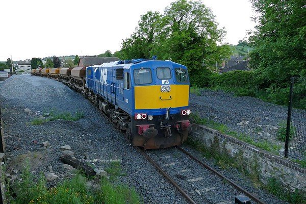 3.6.18. NIR GM 8113 & Ballast Hopper Train on night time ballast duties .Photo taken at Poyntzpass Station.