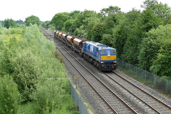 11.6.18. NIR GM 112 passes Silverwood Lurgan on a Ballast Hopper transfer from Belfast to Poyntzpass.