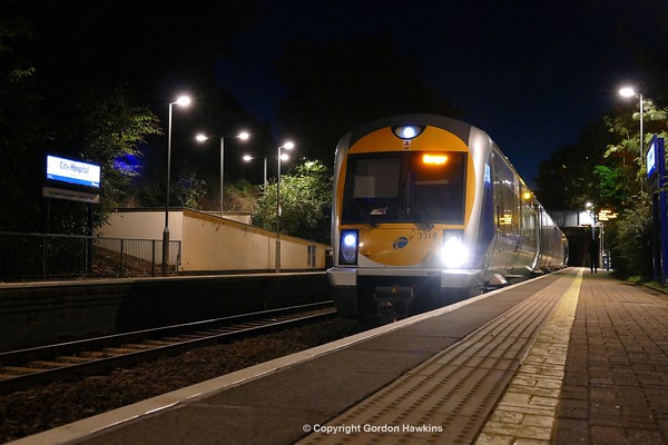 1.10.16. NIR Caf set 3010 calls at City Hospital Halt on a  Portadown to Bangor service train.
