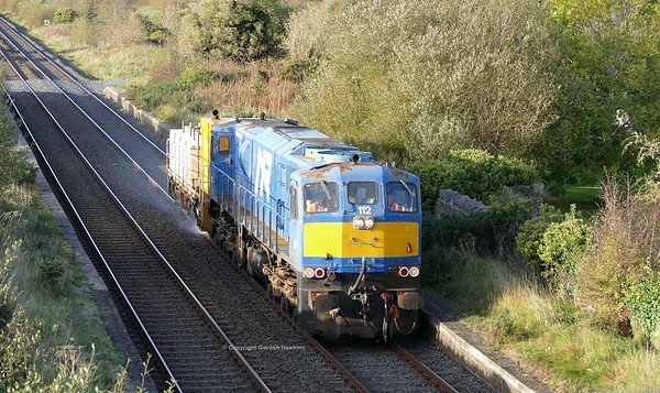 14.10.18. NIR GM 112 & Water Jetter wagon passes Tandragee on its runs from Portadown to Newry.