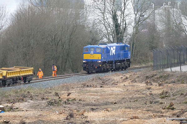 10.2.17. NIR GM 112 transfers 4 Irish Rail spoil wagons from Knockmore to York Road Depot Belfast for wheel turning , the train used the closed Lisburn to Antrim Branch for the transfer. Photo taken at Knockmore .