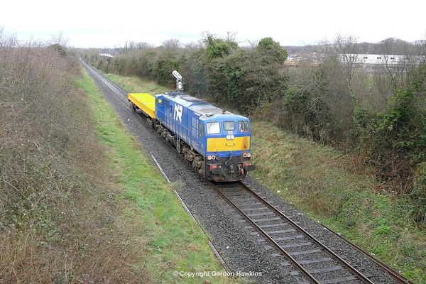 16.3.17.NIR GM 112 transfers an NIR Spoil wagon from Ballymena to Lisburn  The train is seen here arriving into Antrim.
