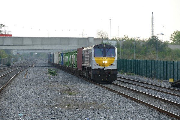13.4.19.GM 8209 passes Clondalkin-Fonthill Station hauling the IWT Liner from Dublin to Ballina.