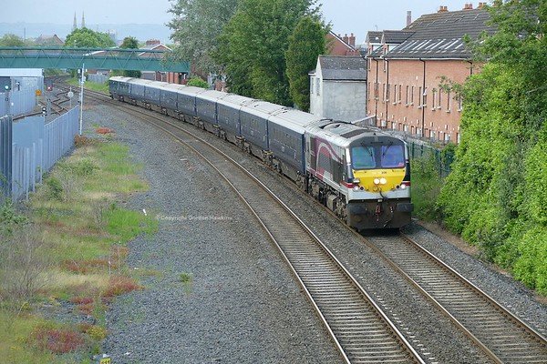 15.6.19. Enterprise GM 206 with the Belmond Grand Hibernian Train passes Adelaide Belfast on its run from Belfast to Dundalk.