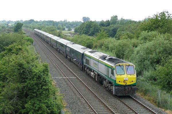 29.6.19. GM 226 with the Belmond Grand Hibernian Train passes Craigavon Lakes heading for Belfast on its run from Dublin.