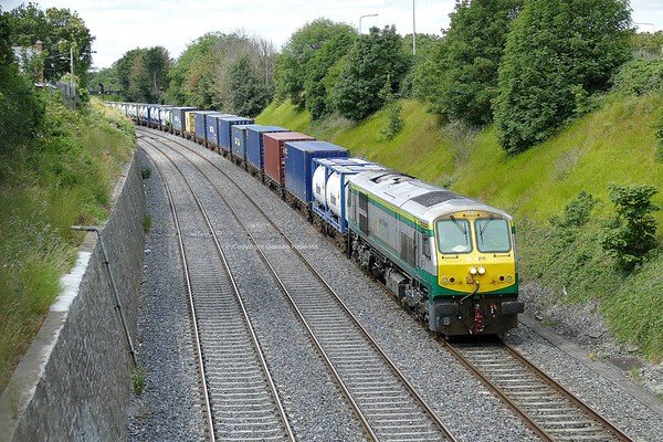 13.7.19. GM 215 passes Memorial Road Dublin with a Ballina to Dublin Port  IWT Liner .