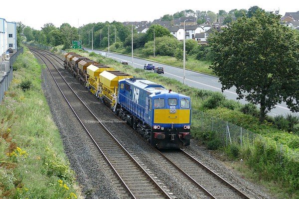 25.7.19. GM 8113  passes Seagoe Portadown hauling the NIR Ballast Train from Belfast to Poyntzpass for loading.