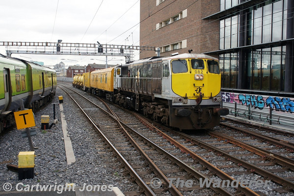 082 hauls the Sperry Train past Grand Canal Dock with the 0940 Heuston - Wexford working. Fri 04.04.14